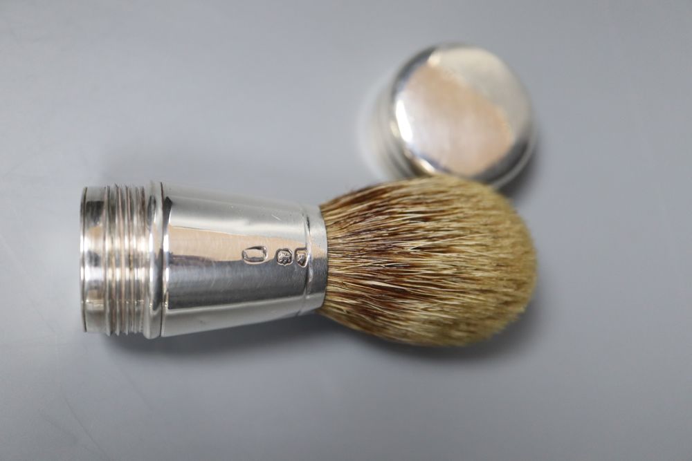 A Victorian silver cylindrical cased travelling shaving brush, Thomas Johnson I, London, 1869, 75mm (